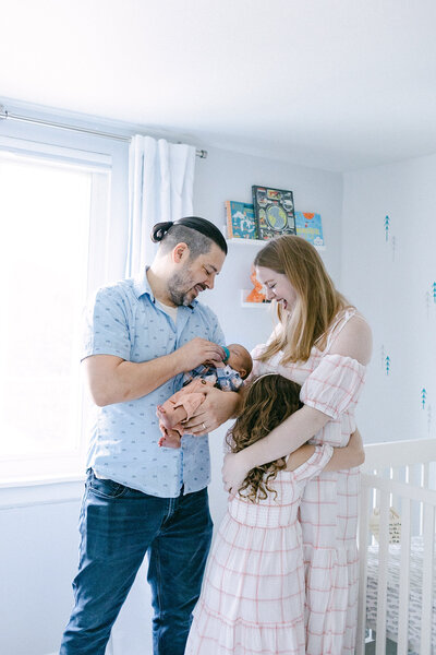 family newborn photography session in home lifestyle photography