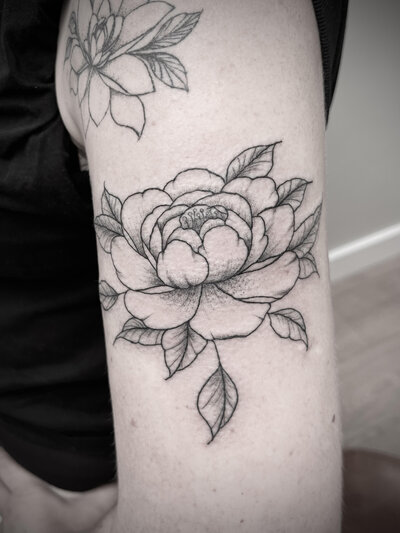 Fine line floral tattoo by Vamp Ink'd