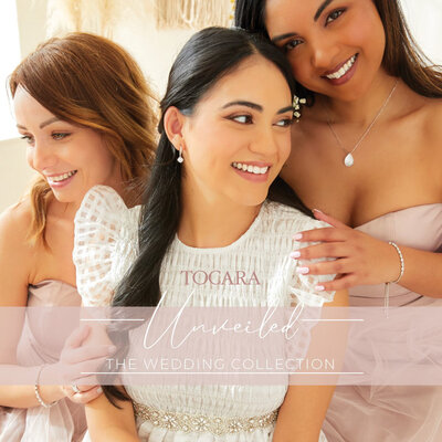 three woman holding each other highlighting their silver jewelries