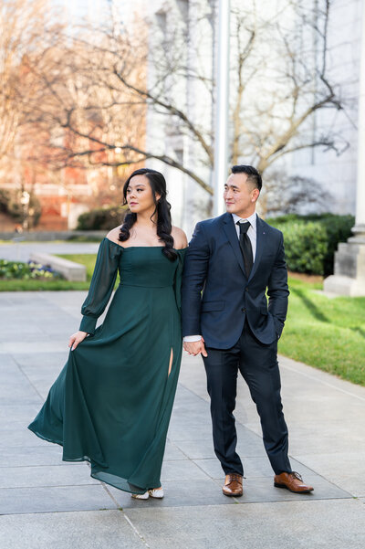 Bride and groom walk up memorial steps at their DC wedding