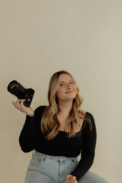 megan shaw holding camera