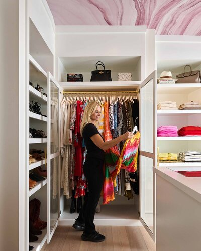 Organizing a women's walk-in closet