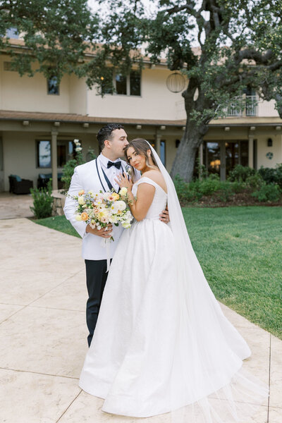 Luxury wedding at Eagle Oak Ranch in Paso Robles with sunset portraits among the rolling hills