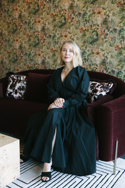 bride holding groom's arm walking