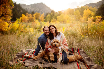 Lifestyle photo for local blogger in Colorado of cute family with their dog.