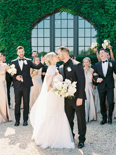 Fine art wedding party photo with classic white florals at an estate venue, captured by Seattle and Washington DC wedding photographer.