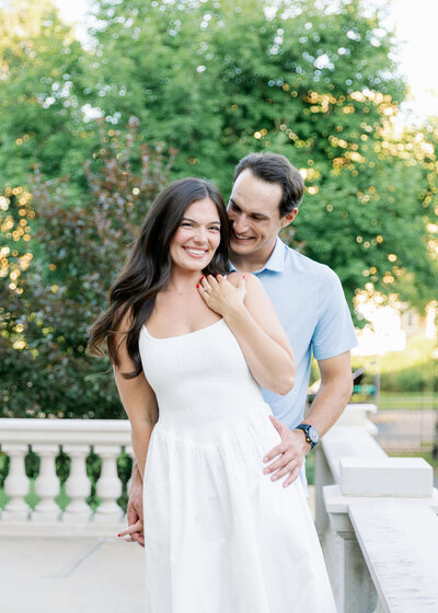 A couple pauses for a pictures of their engagement at the American Swedish Institute. 
