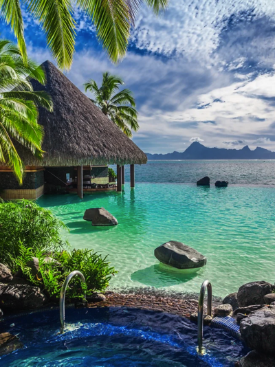 A serene tropical scene with a thatched-roof hut over crystal-clear waters, showcasing paradise and relaxation.