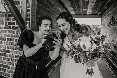 photographer showing the back of her camera