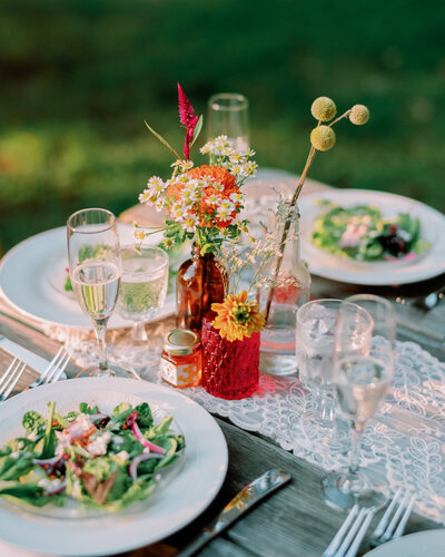 A table setting shows blue and green accents.