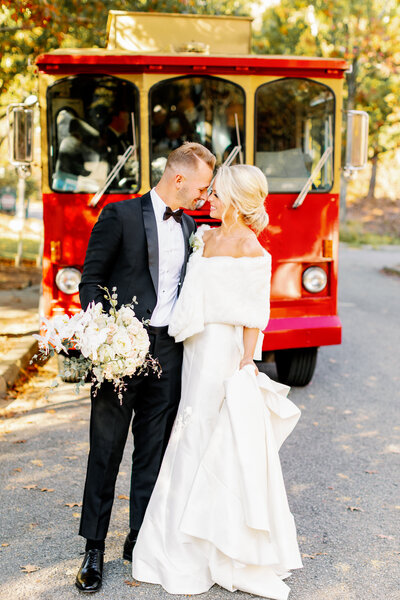 Bride and Groom in front of vintage trolley | Threefold Events Wedding | Maddie Moore Photography