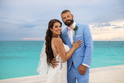 Wedding couple pose after ceremony in Bimini