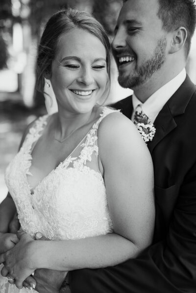 Wedding couple smiling and laughing