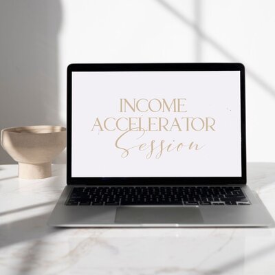 laptop with income accelerator session
