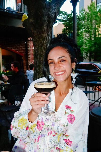 Teresa toasts her friends with an espresso martini