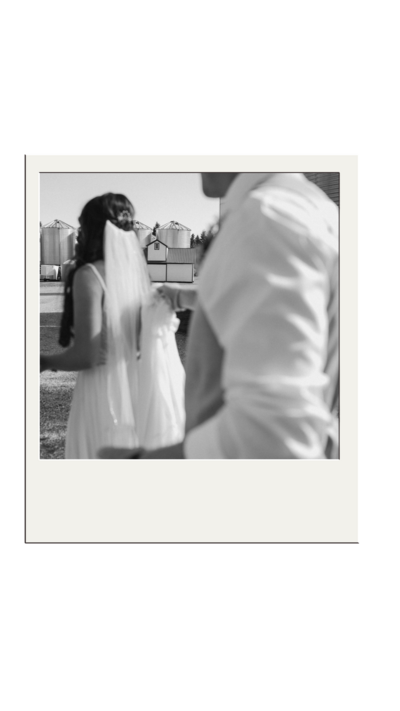 A polaroid photo of a wedding couple holding hands