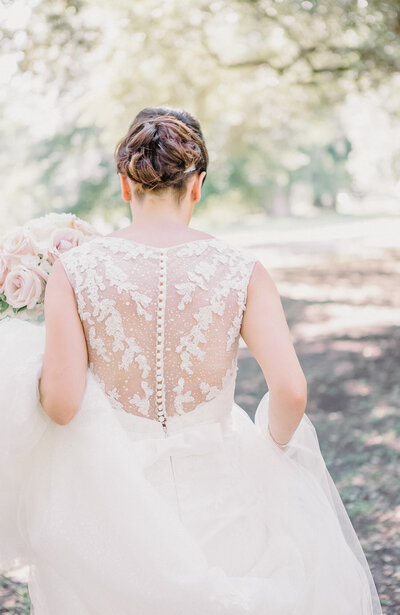 intricate lace details on back of wedding gown