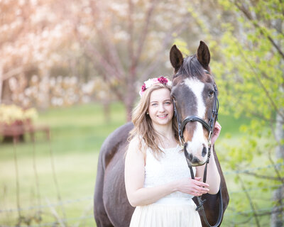 Girl throwing leavesGirl with horse portrait session| Gloucestershire Family Photographer