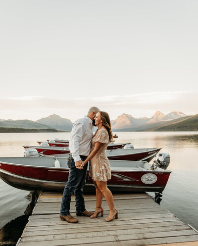 couple being intimate at lake mcdonald in glacier national park