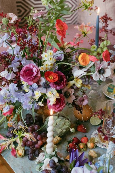 bloom bloom florals at fouquet's new york hotel tablescape for maximalist colorful elopement spread with pearled fruit and solid wiggles