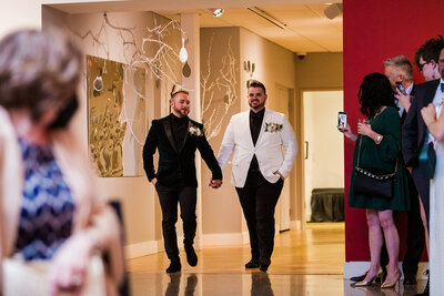 Couple enters wedding ceremony at Erie Art Museum