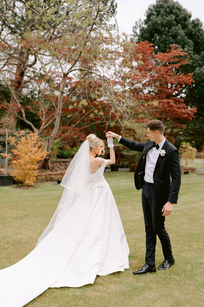a wedding couple embracing at their wedding in ireland at adare manor