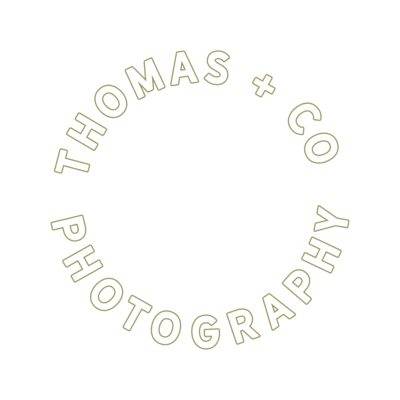Thomas+Co_secondary-logo-circle-text-outline-olive