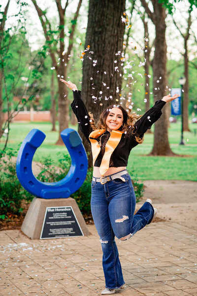 College graduation photoshoot at MTSU near the horseshoe