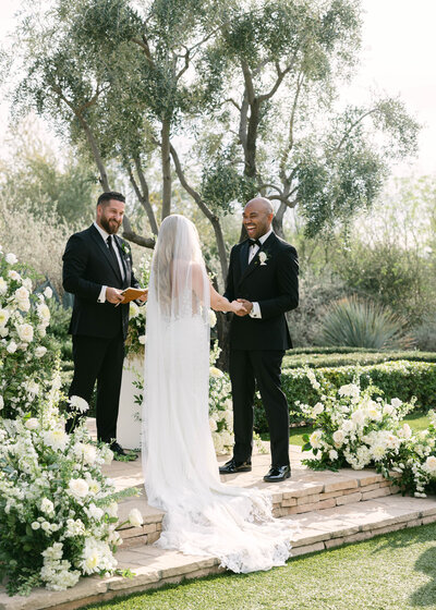 Bride and Groom exchange vows on the lawn of El Chorro in Scottsdale Arizona.