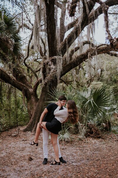 Nashville engagement photographer captures spring engagement session with couple kissing