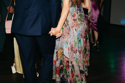 Wedding Guests Holding Hands