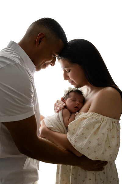 A mom holding her newborn baby