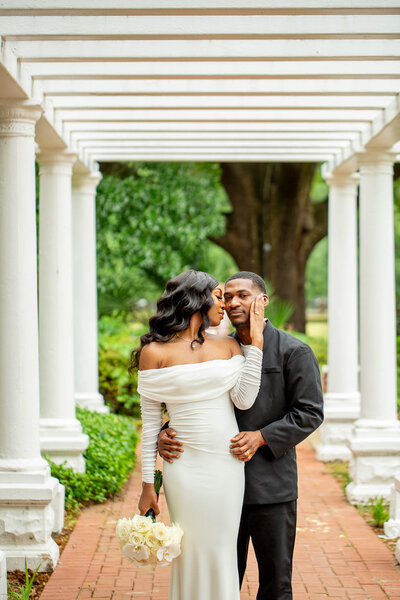 Captured in the serene Hampton-Preston Estates gardens, a stylish Black couple celebrates their elopement with their two children. A beautiful family moment that defines love and togetherness.