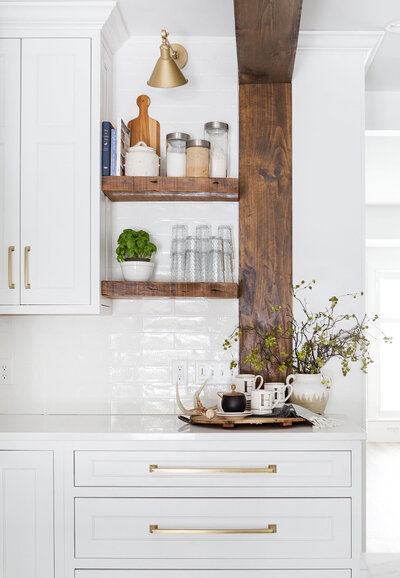 White and gold luxury countertops with exposed wood beams