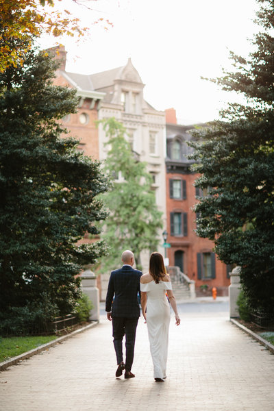 Newly wed couple photographed at Rittenhouse Park, in Center City Philadelphia after their City Hall elopement.
