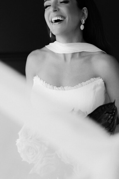 This stunning photo by Martine L Photography captures the elegance of a black-tie wedding held at the historic Auberge St. Gabriel in Montreal's charming Old Port. The image beautifully showcases the sophisticated ambiance, exquisite décor, and timeless romance of the event, reflecting the luxury and refinement of this unforgettable destination celebration