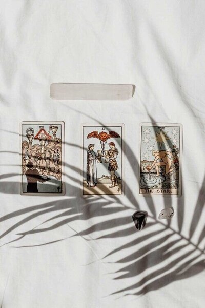 Tarot cards laid out representing intuitive guidance, transformation, and personal insight.