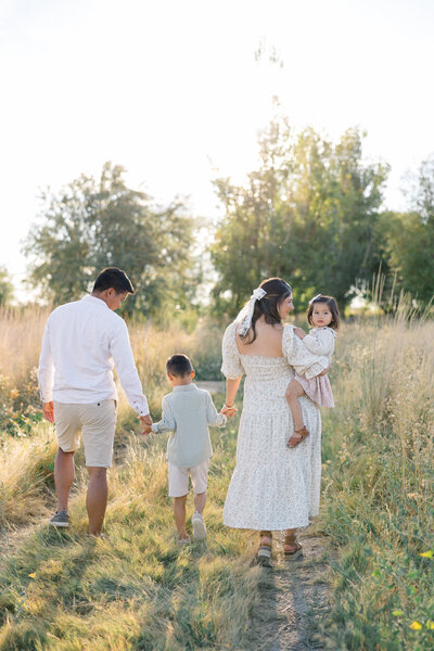 family walking in field