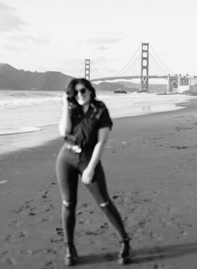 Black and white blurred photo of woman in front of the Golden Gate Bridge