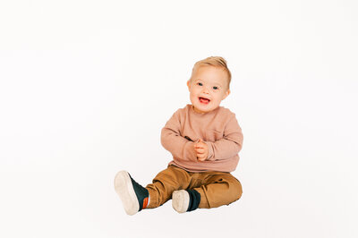 baby boy laughing and clapping captured by Springfield MO kids photographer Jessica Kennedy of The XO Photography
