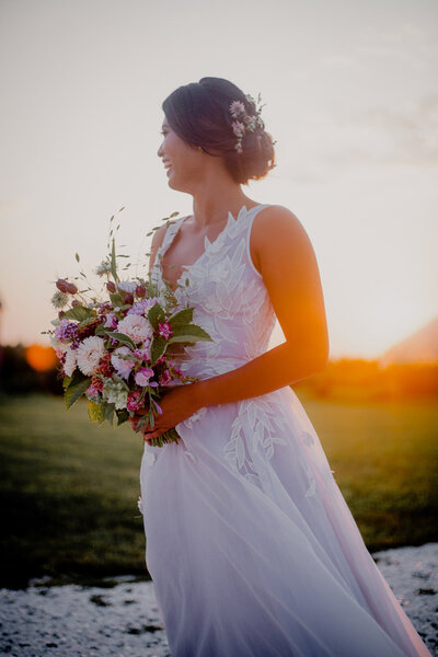 Bride holding flowers at Connecticut wedding