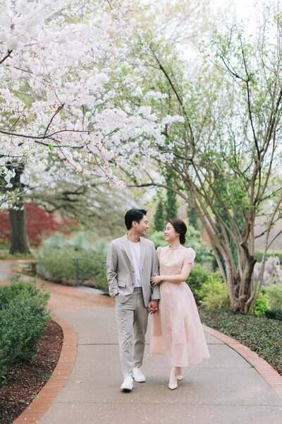 Bride and groom walk up memorial steps at their DC wedding
