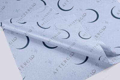 Crescent moon brand pattern on a tissue paper mockup.