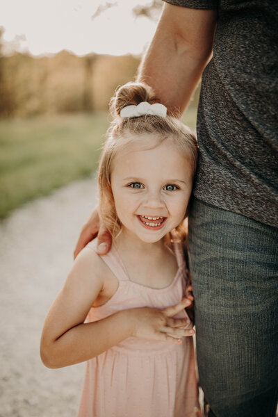 photo of a little girl in a pink dress