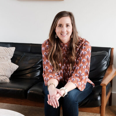 Tara Mosier sitting on couch