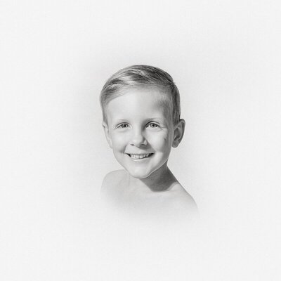 Soft childhood portrait in black and white by a child photographer in Michigan
