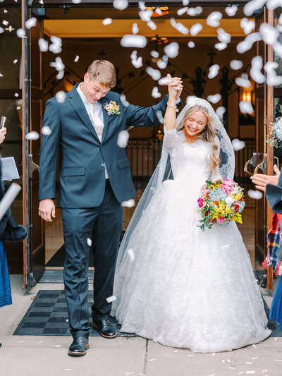 Bride and Groom exit Traditional Catholic Ceremony with confetti exit. 