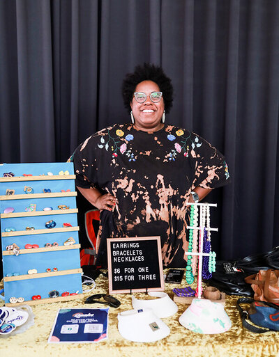 Female jewelry artist at Birmingham market
