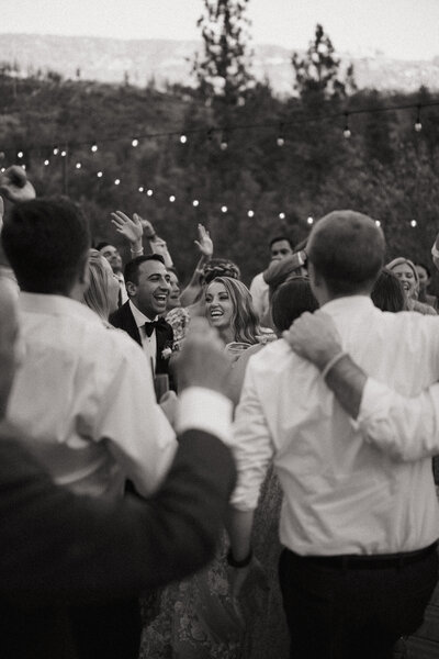 Wedding reception dance party black and white image