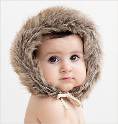 Baby-with-furry-hat-photography-services
